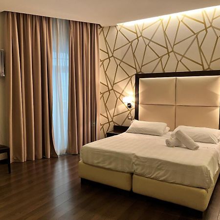 Catone District Hotel Rome Bagian luar foto