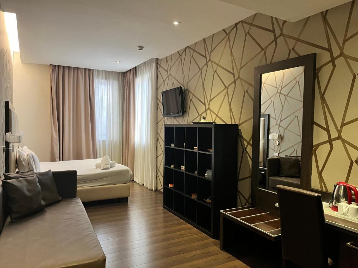 Catone District Hotel Rome Bagian luar foto