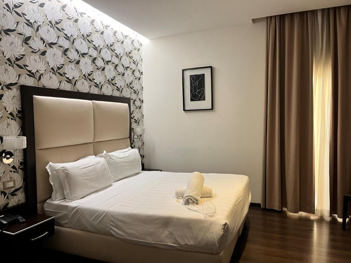 Catone District Hotel Rome Bagian luar foto